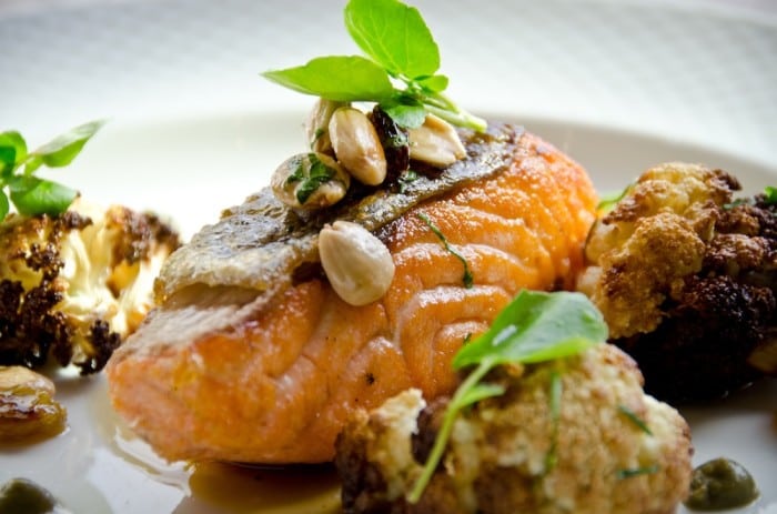 Natera's crispy Bay of Fundy salmon with cauliflower and almond-raisin sauce