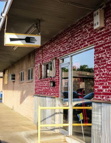 fork in the road's entrance
