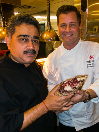 Dallas Chop House chefs A.J. Joglekar and Chad Starling with their 459-day dry-aged prime beef rib-eye